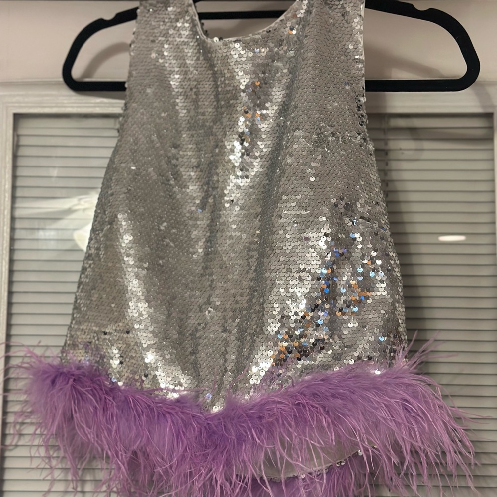 Sparkling Silver and Purple top

Never worn 
Size small
